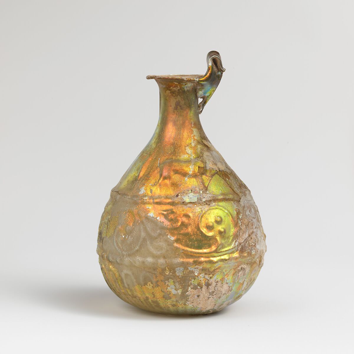 Glass hunt-and-scroll bottle, Glass, Roman