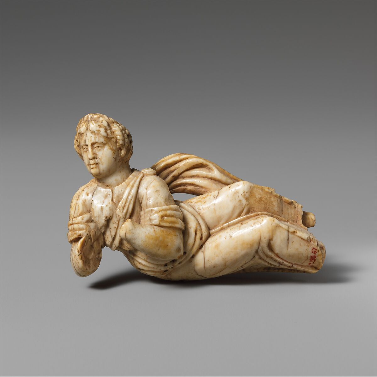 Ivory statuette of a reclining woman, Ivory, Roman 