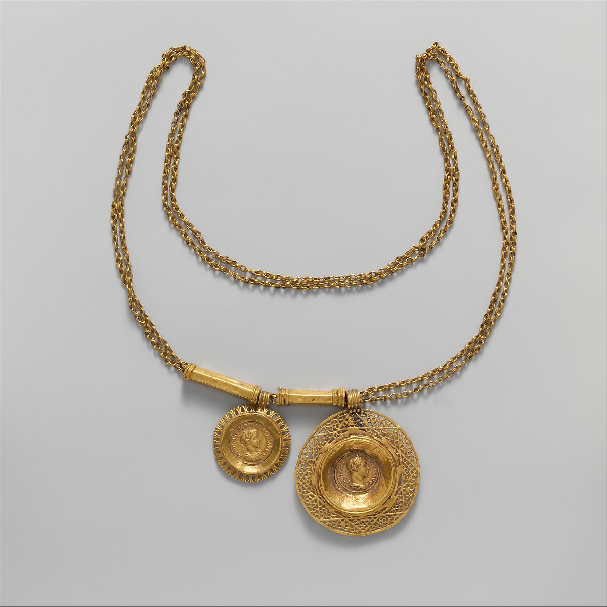 Gold necklace with coin pendants