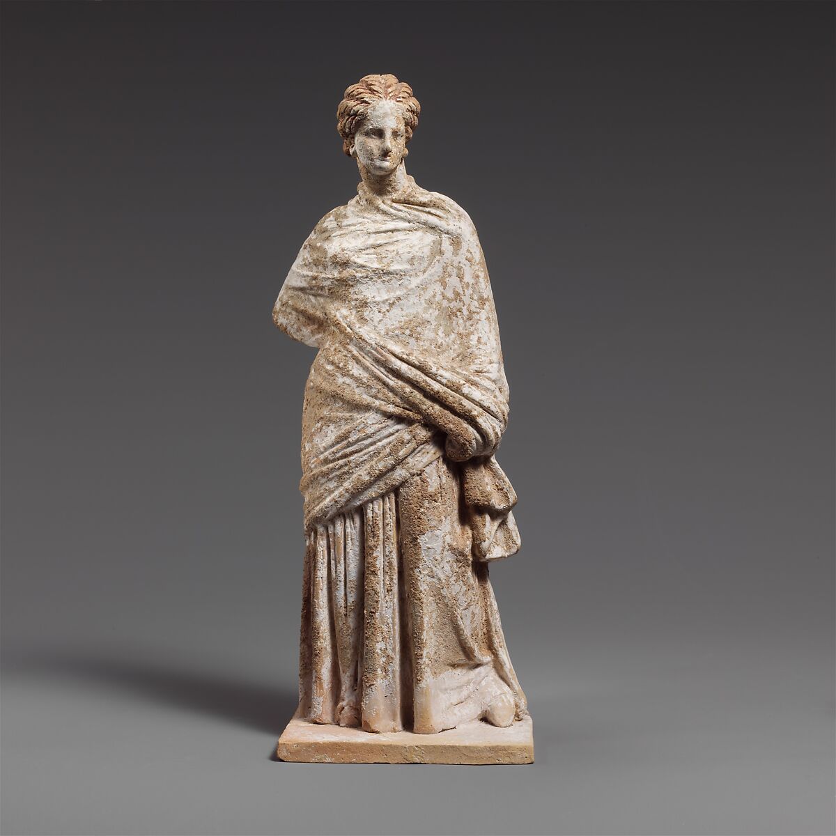Terracotta statuette of a draped woman, Terracotta, Greek, probably Boeotian 