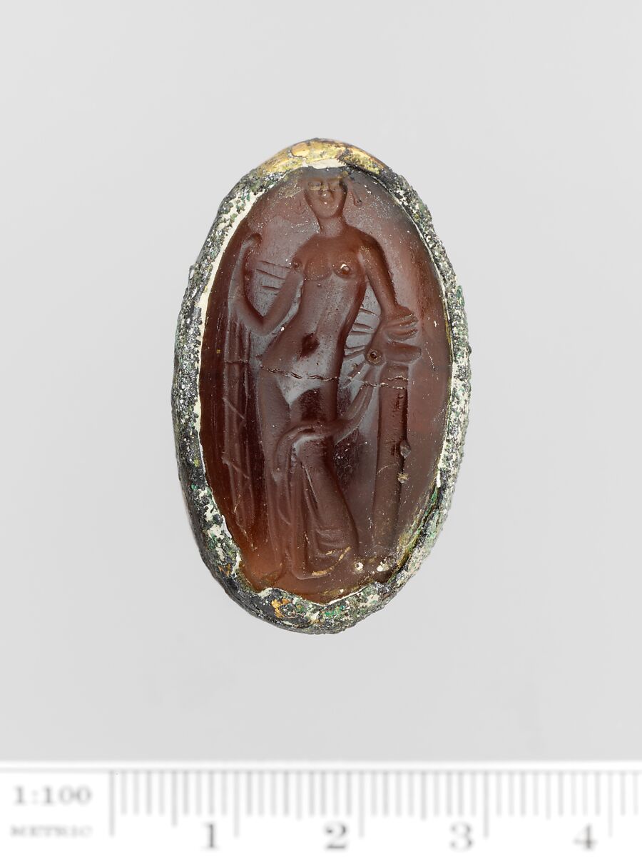 Glass oval set in a gilt bronze ring, Glass, brown, Greek 