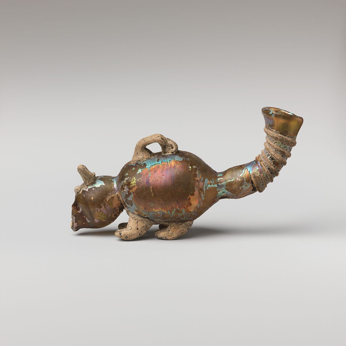 Glass bottle in the shape of an animal, Glass, Roman 