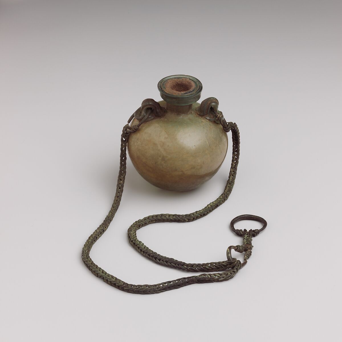 Glass aryballus (oil bottle) with bronze suspension chain, Glass, Bronze, Roman 