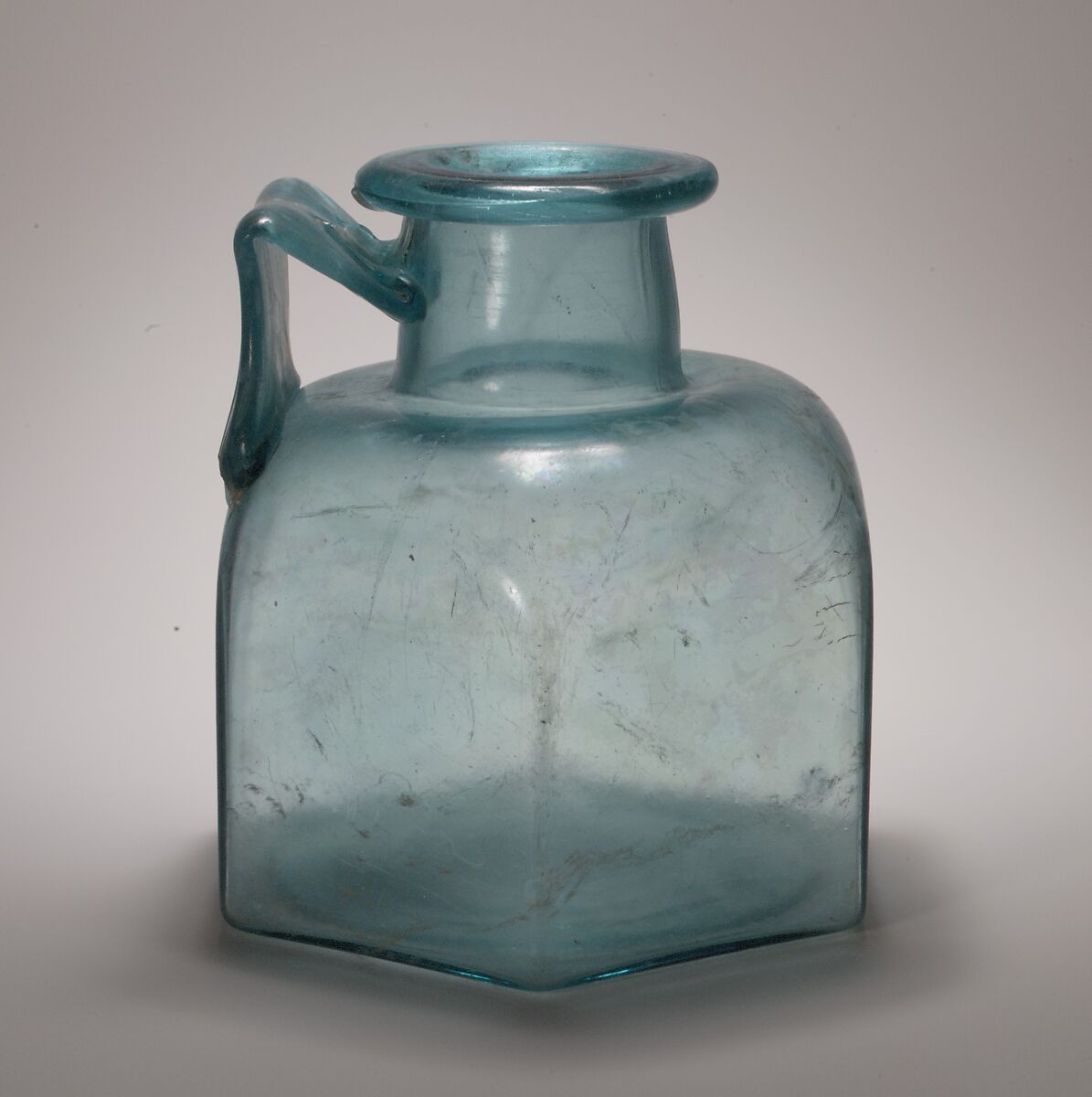 Glass one-handled hexagonal bottle, Glass, Roman 