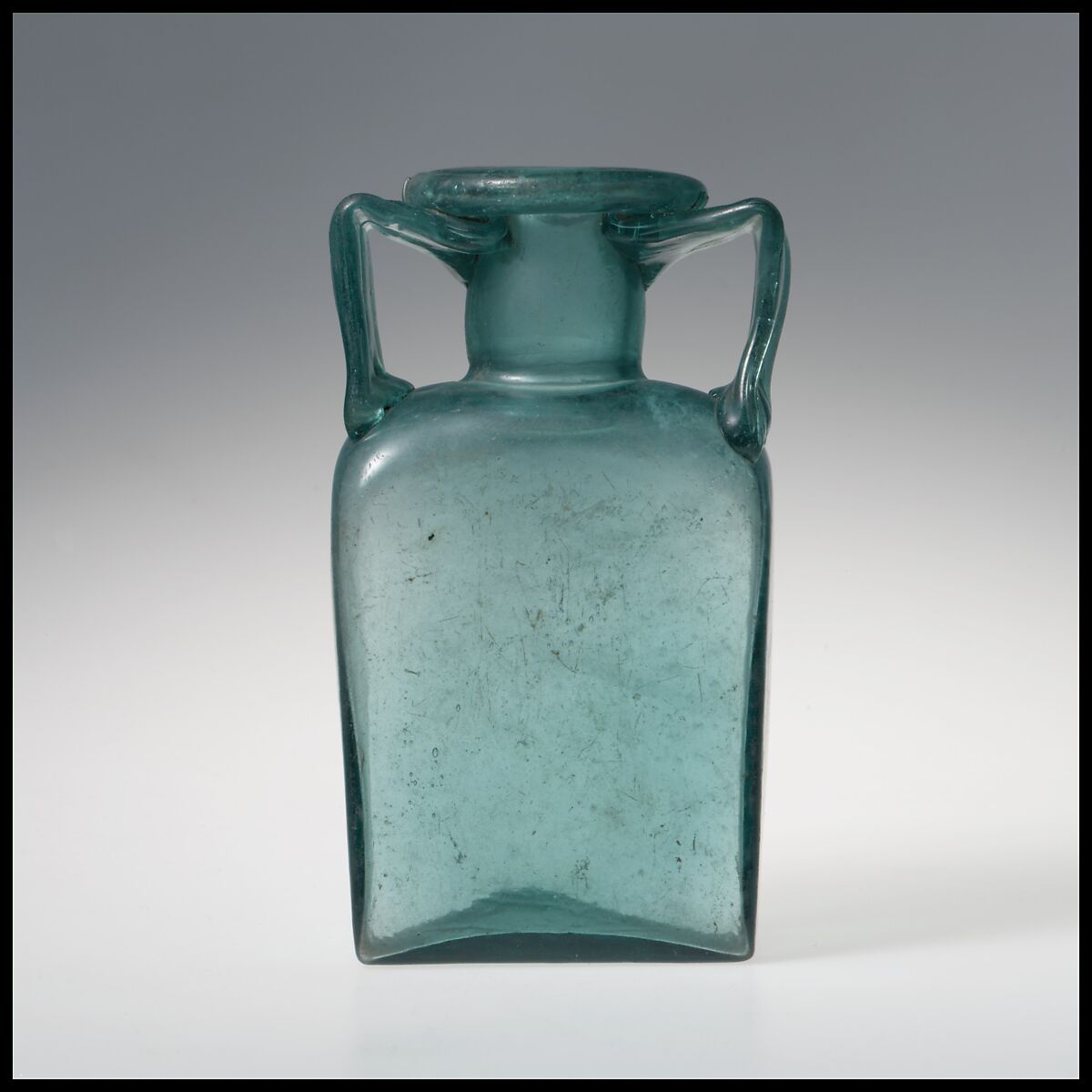 Glass rectangular bottle, Glass, Roman