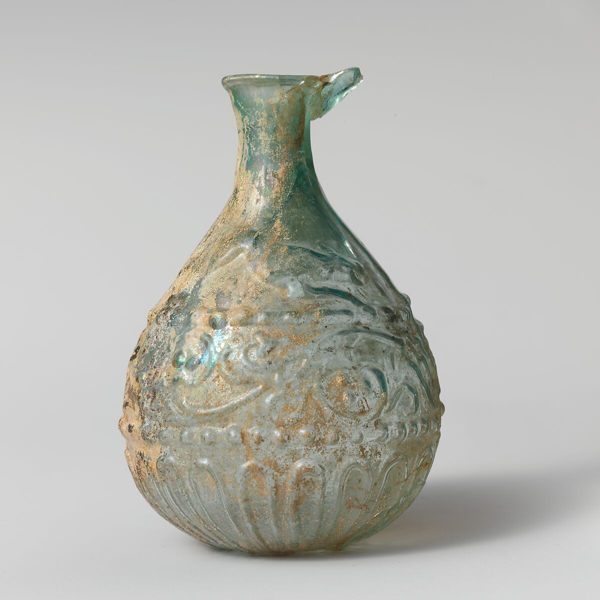 Glass hunt-and-scroll bottle, Glass, Roman