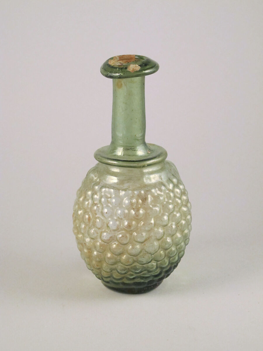 Glass bottle in the shape of a bunch of grapes, Glass, Roman, Syrian 