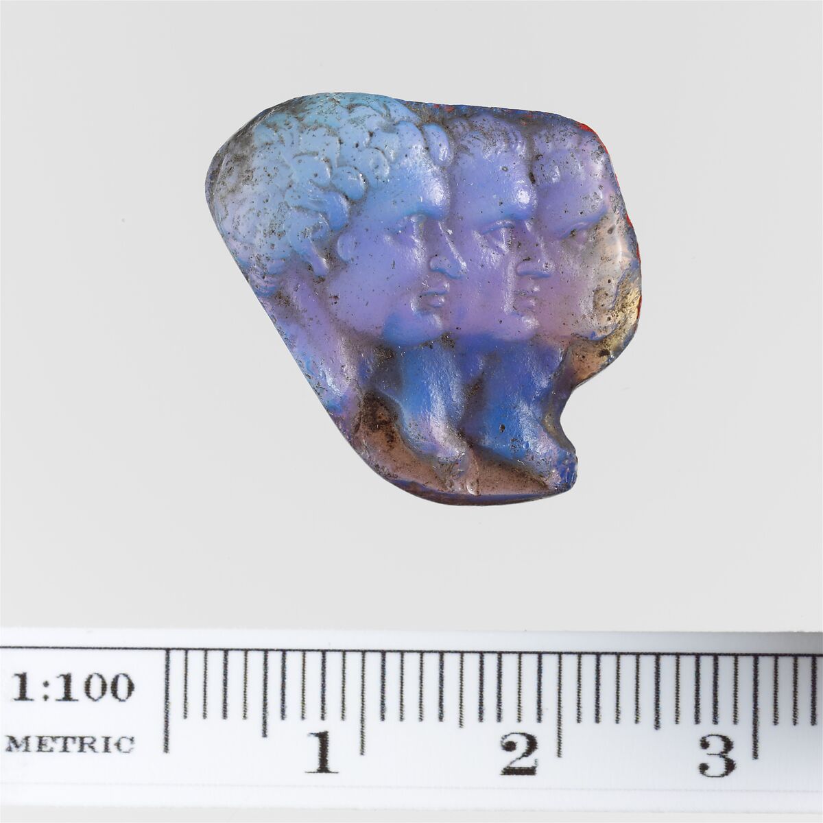 Cameo glass with three portrait heads, Glass, blue and brown, Roman 