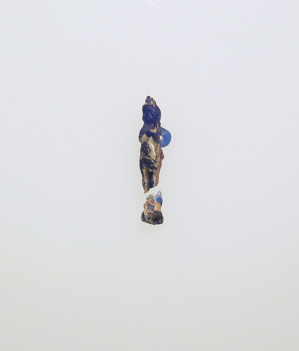 Glass pendant in the shape of Harpokrates, Glass, Greek, Eastern Mediterranean 