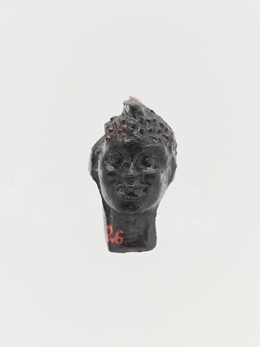 Glass pendant in the shape of a Black African’s head