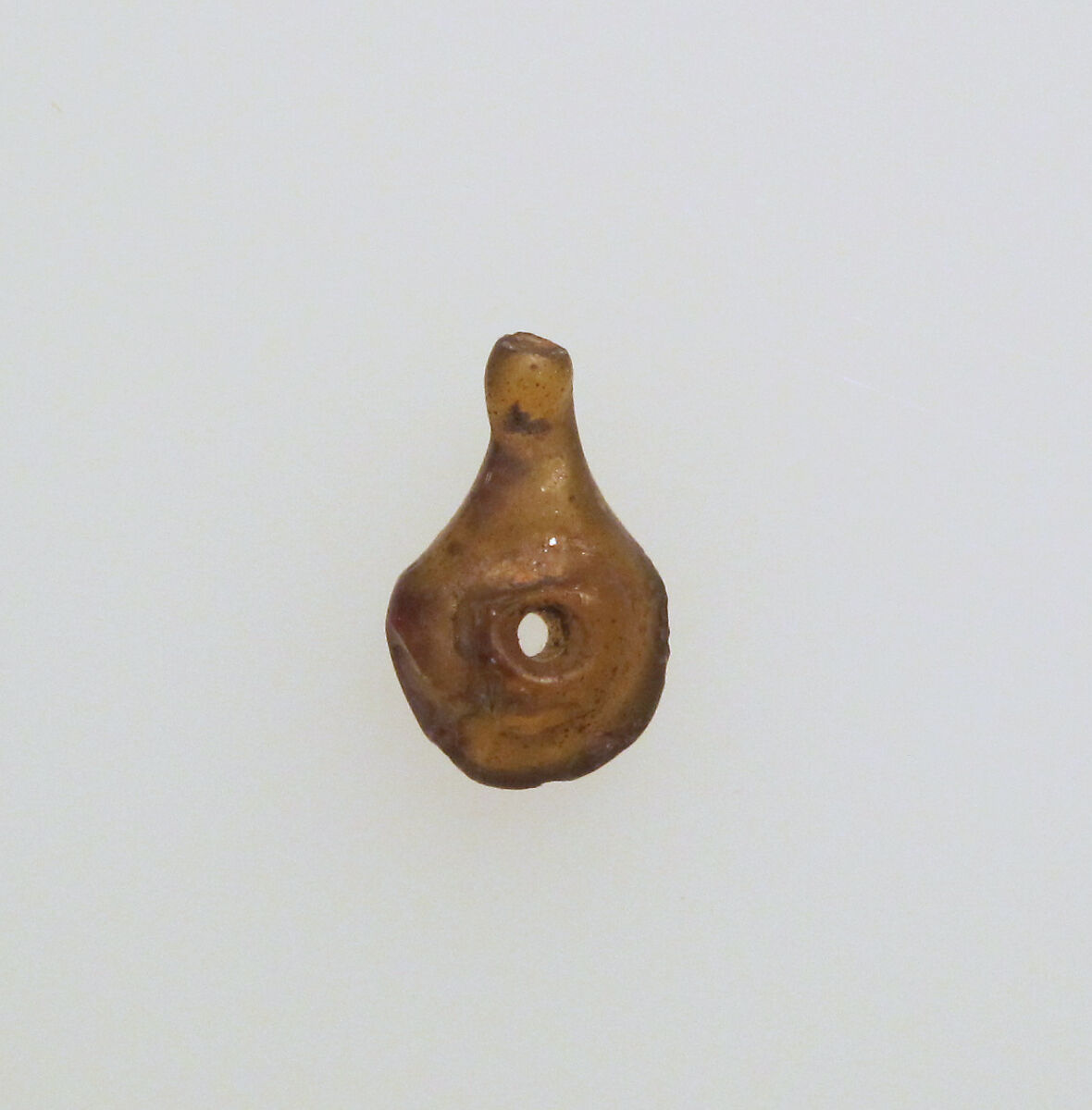 Glass pendant in the form of a lamp, Glass, Hellenistic, Roman, or Islamic 