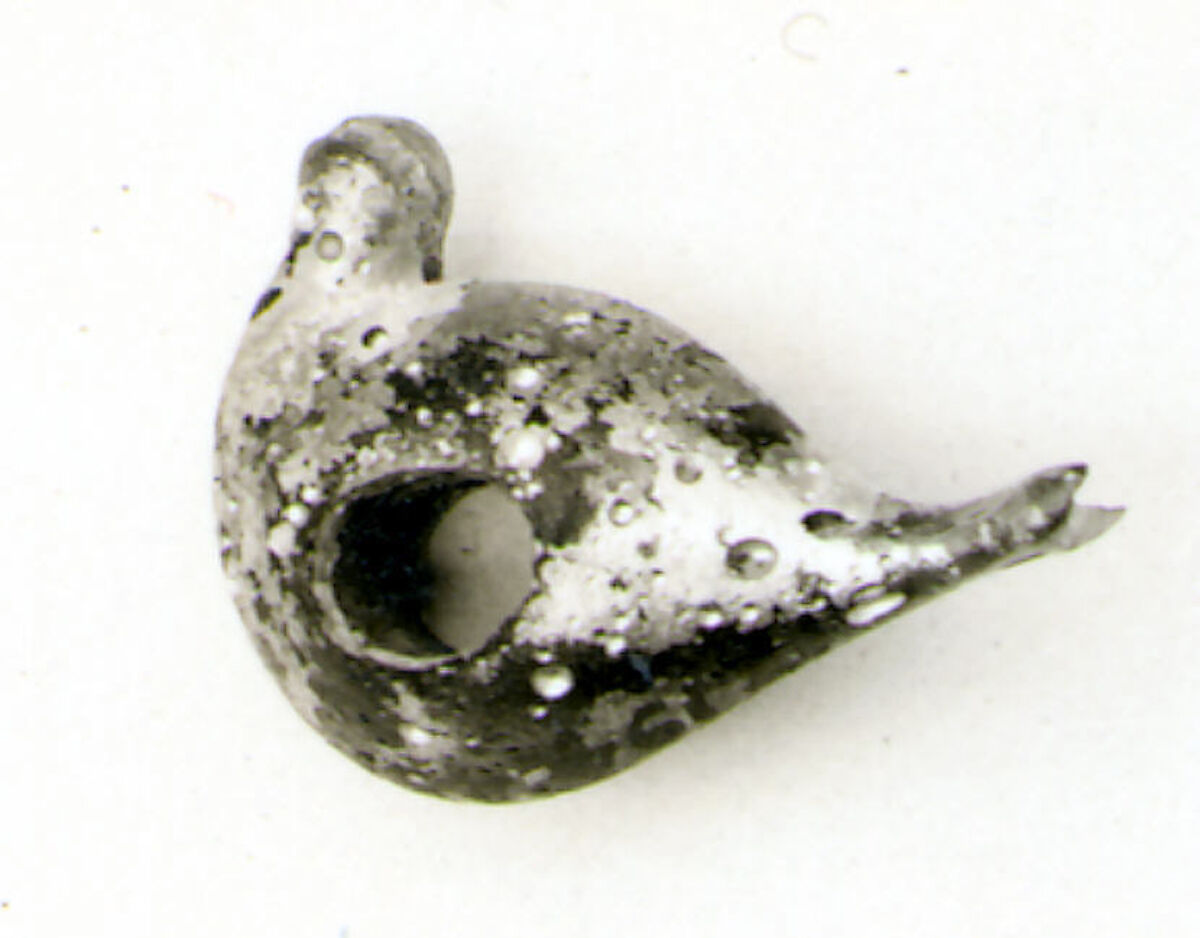 Glass pendant in the form of a bird, Glass, Greek, possibly Rhodian