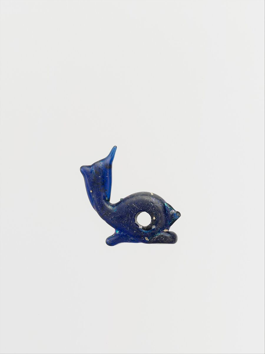 Glass pendant in the form of a dolphin, Glass, Roman 