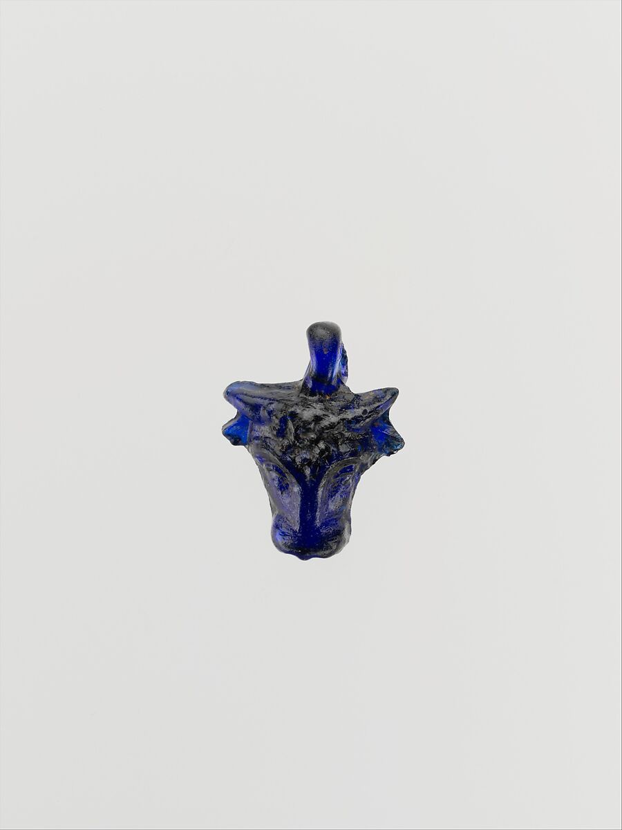 Glass pendant in the form of a bull’s head, Glass, Greek, Eastern Mediterranean 