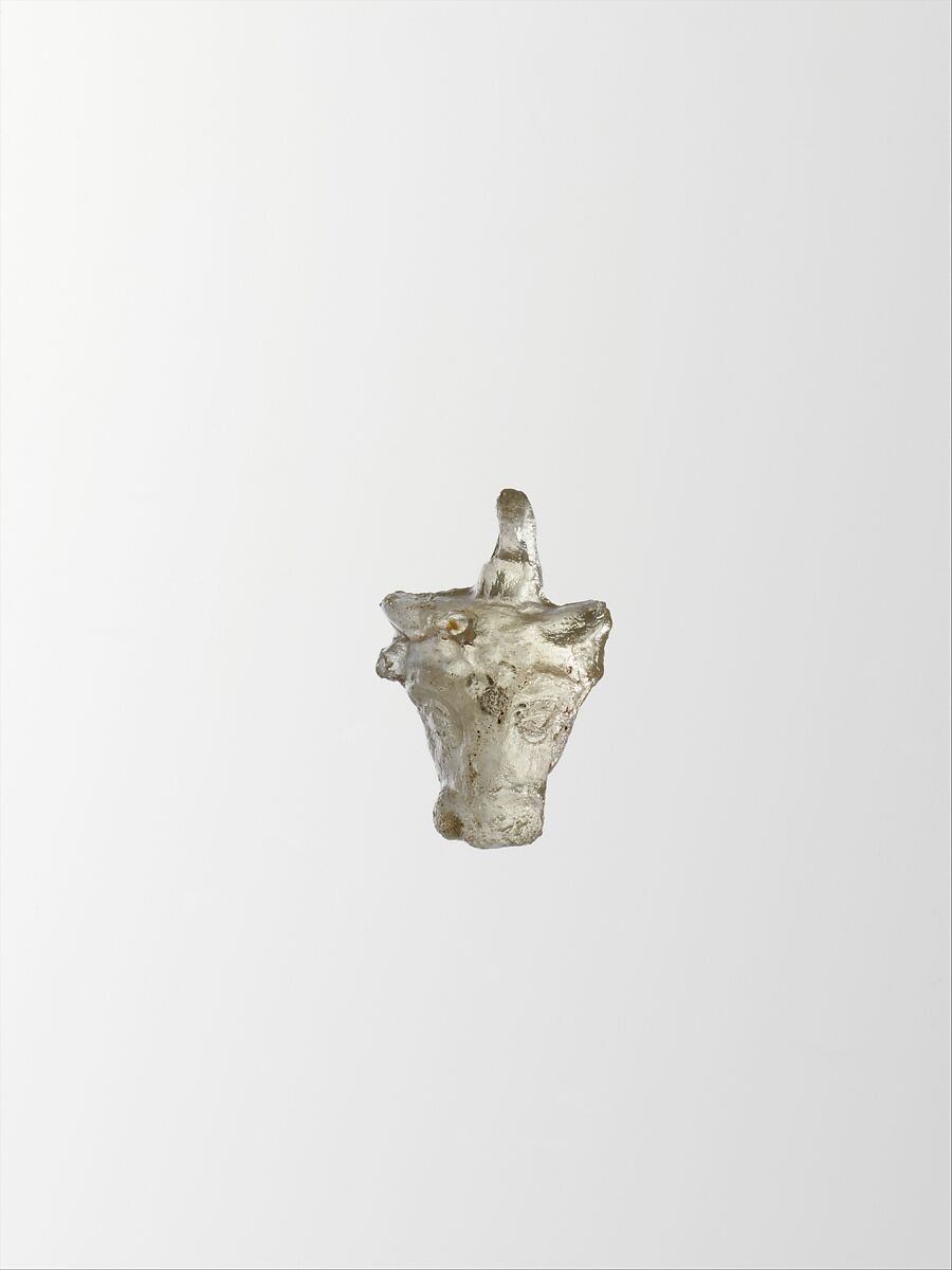 Glass pendant in the form of a bull’s head, Glass, Greek, Eastern Mediterranean 