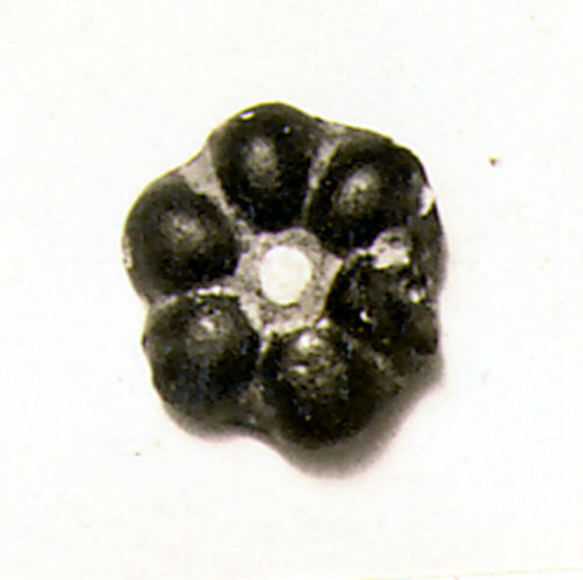 Glass bead in the form of a rosette, Glass, Roman