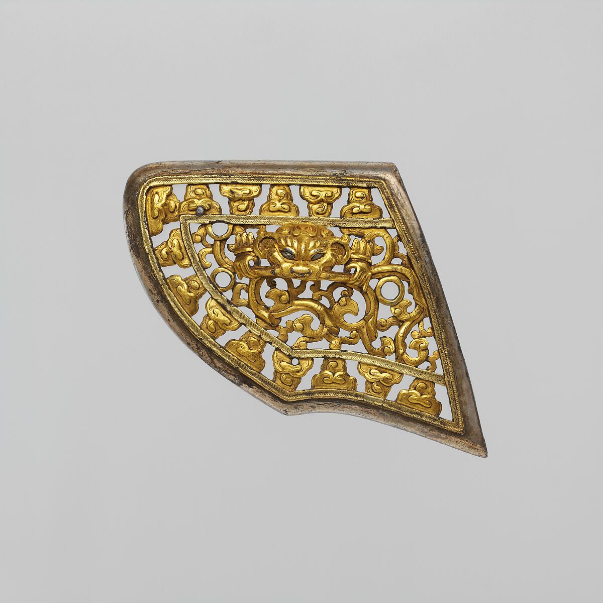 Nineteen Ornamental Fittings from a Horse Harness and an Ornamental Saddle Steel, Iron, gold, silver, copper, leather, saddle plate, Chinese or Tibetan; harness fittings, Tibetan