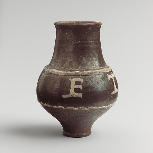 Terracotta beaker with painted inscription