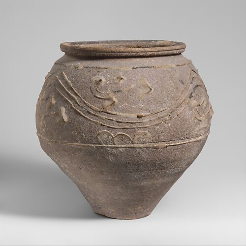 Terracotta jar with barbotine decoration