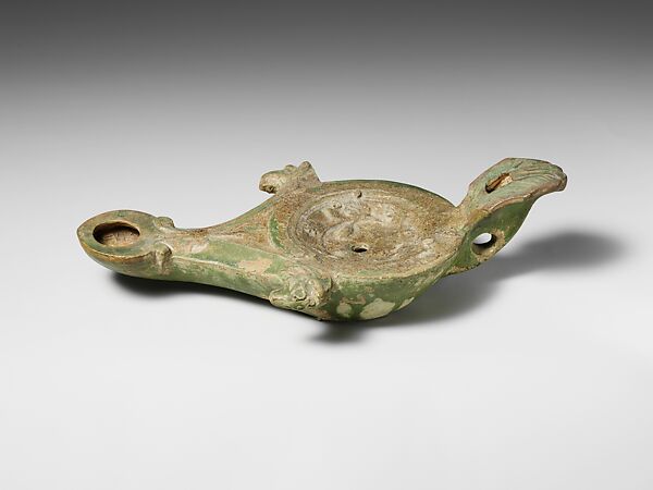 Terracotta oil lamp