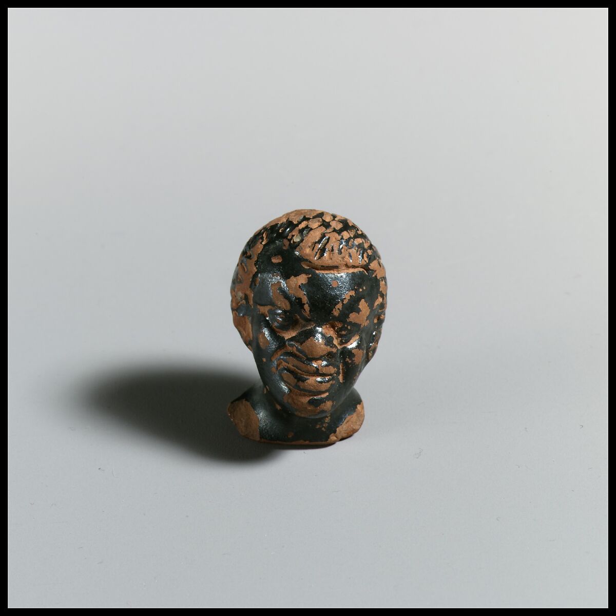 Head of a Black African man, Terracotta, Greek, South Italian, Campanian 