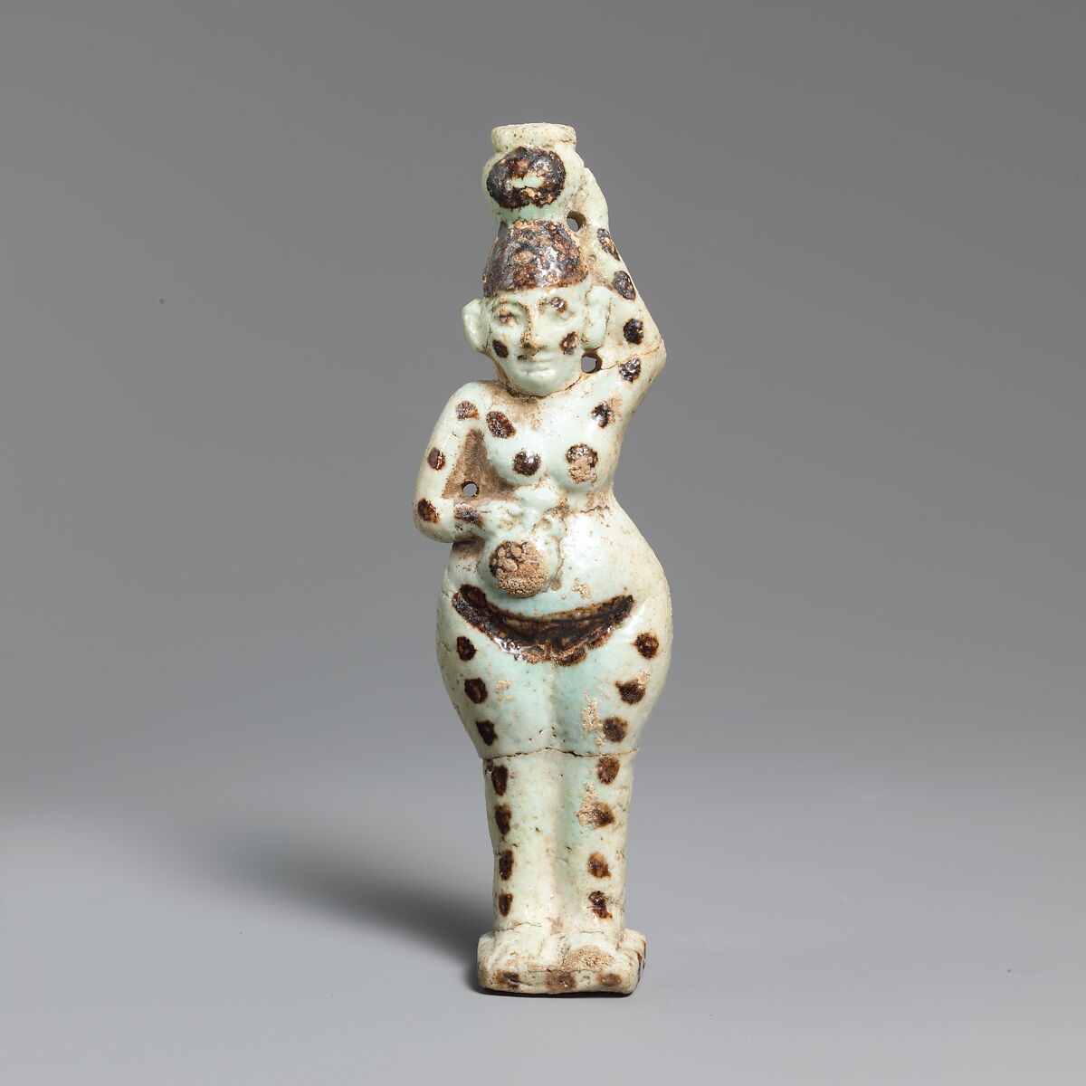 Faience statuette of a woman holding two vases, Faience, East Greek 