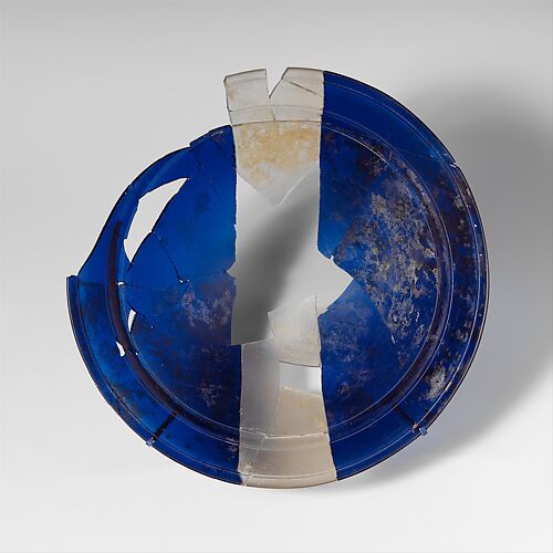 Glass bowl in blue and colorless bands