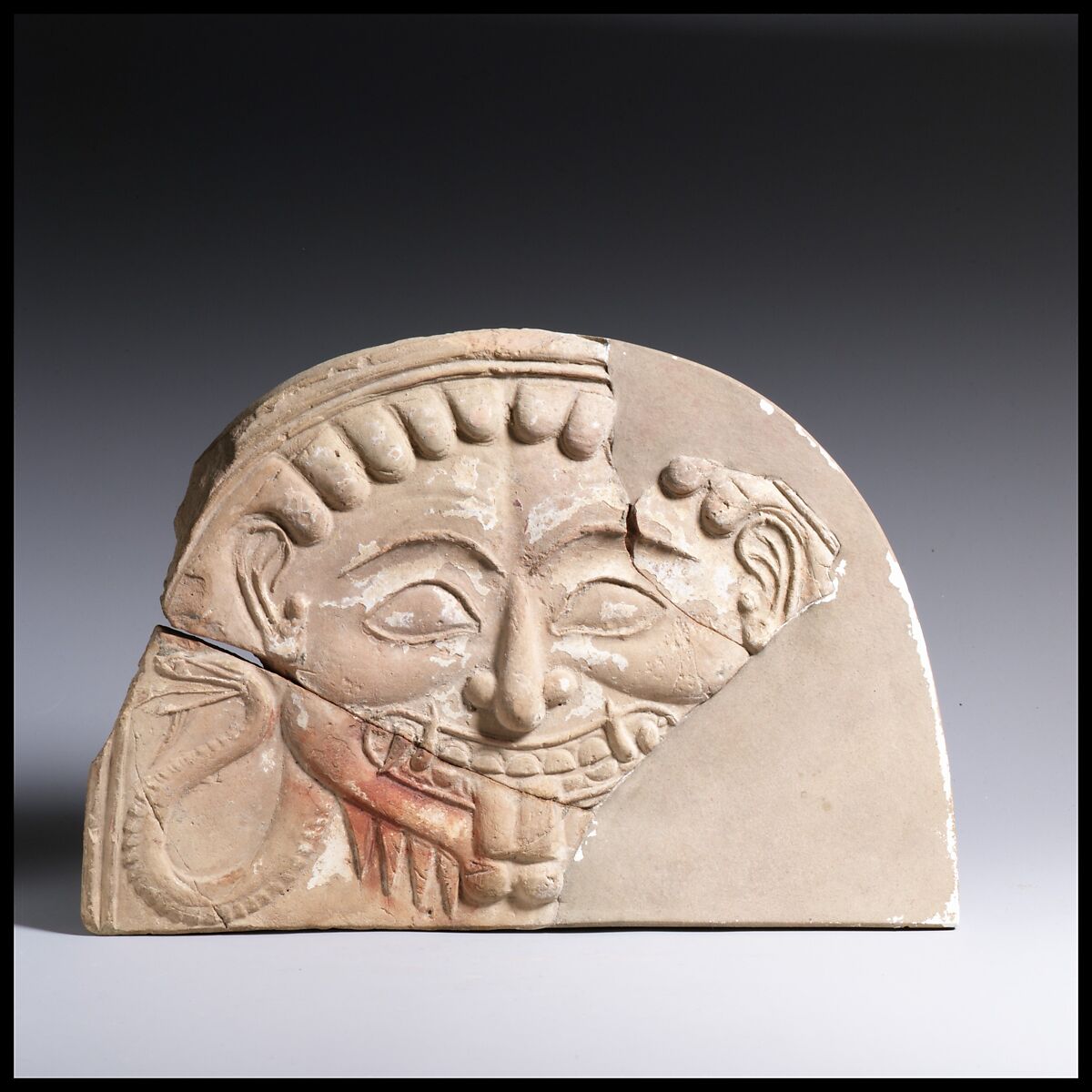 Antefix, head of Medusa, Terracotta, West Greek 
