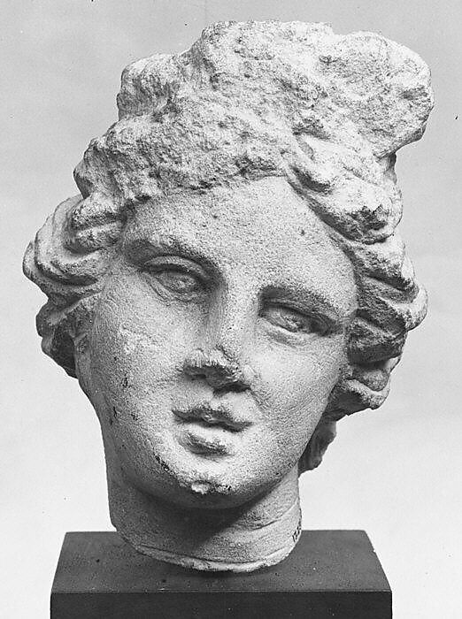 Limestone head of a girl, Limestone, Greek 