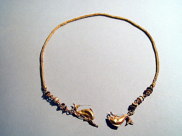 Gold chain with dolphins and glass beads