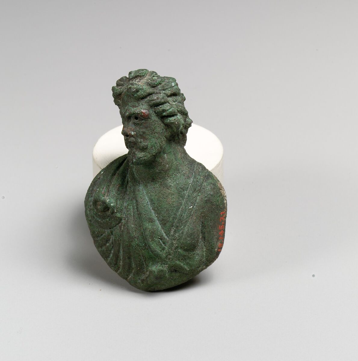 Bronze appliqué in the form of a bust of a barbarian, Bronze, Roman 