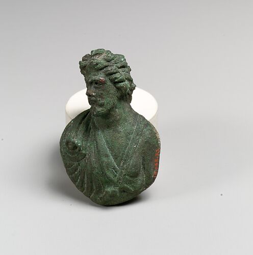 Bronze appliqué in the form of a bust of a barbarian