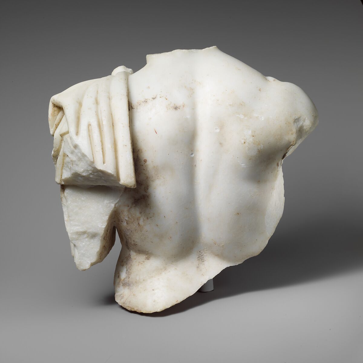 Upper part of a marble torso of a man, Marble, Island, Roman