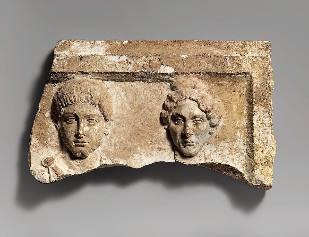 Top of a marble funerary relief with portrait busts of a young man and an elderly woman, Marble, Roman