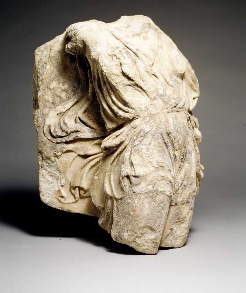 Fragment of a marble relief with a Nike, Marble, Island, Greek