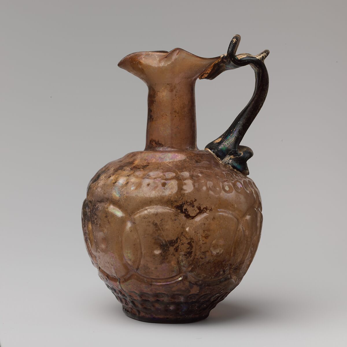 Glass jug decorated with intersecting circles, Glass, Roman 