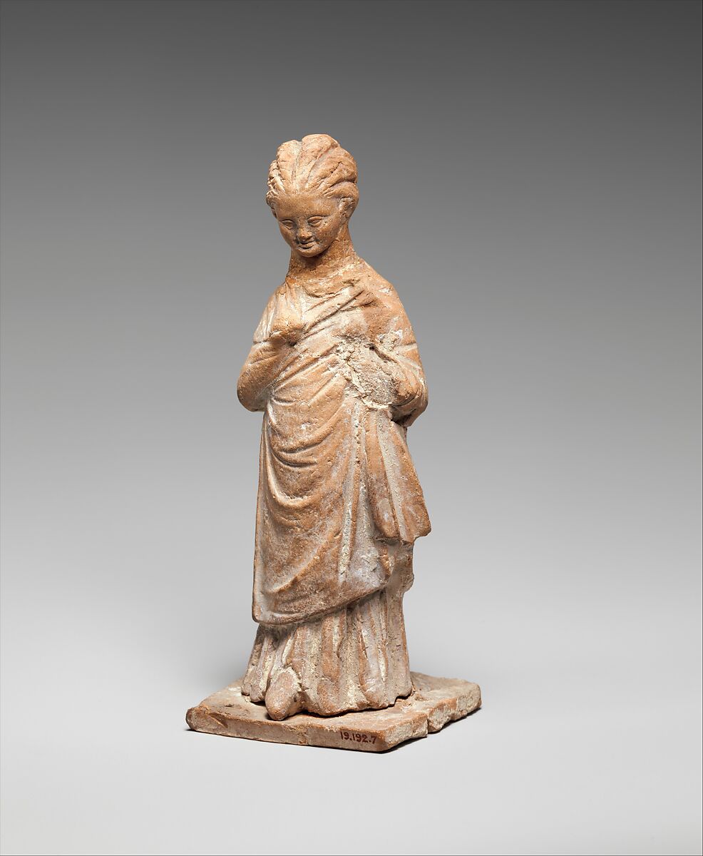 Terracotta statuette of a standing girl, Terracotta, Greek, probably Boeotian