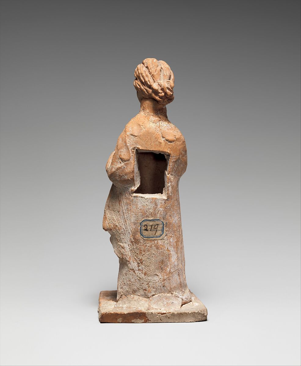Terracotta statuette of a standing girl, Terracotta, Greek, probably Boeotian