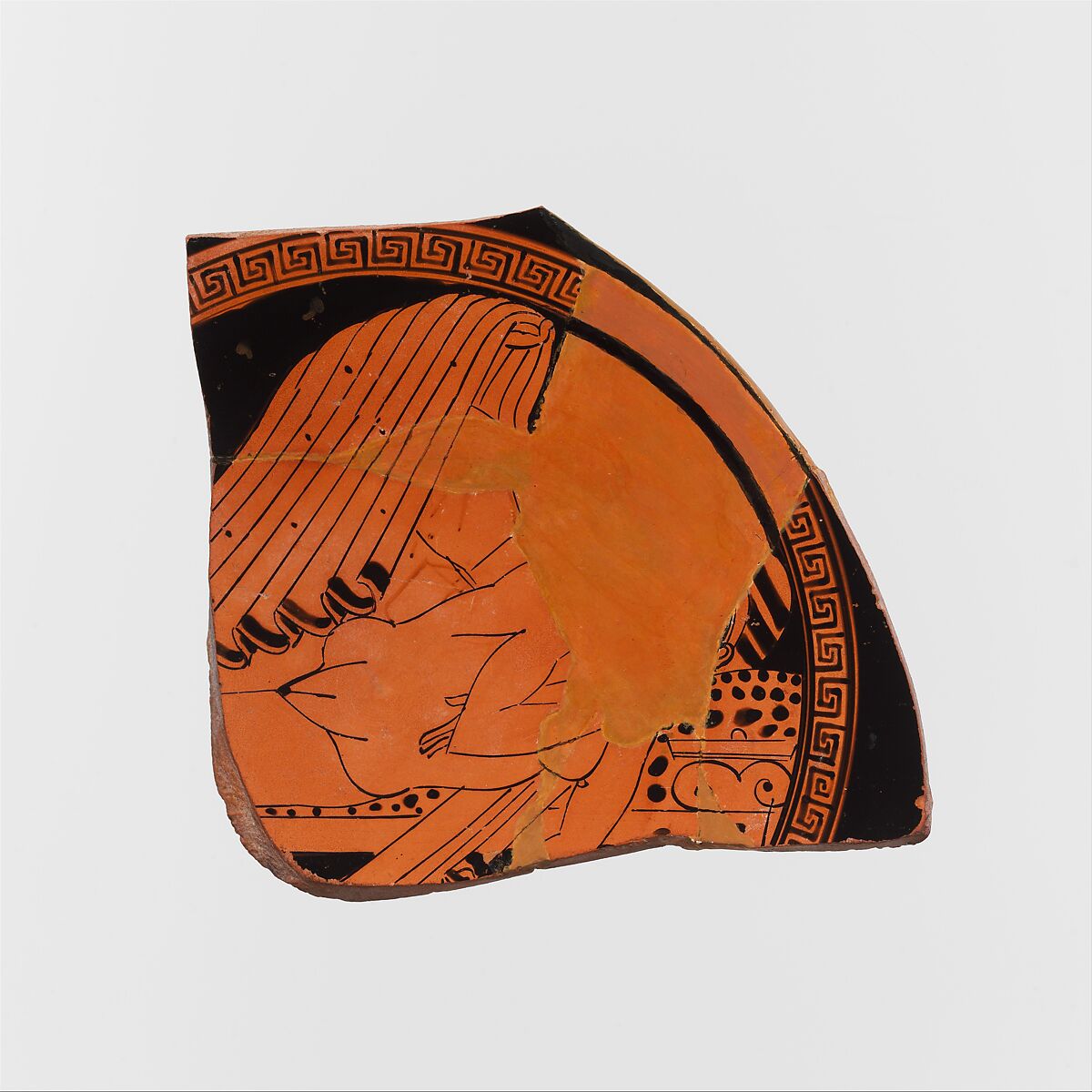 Fragment of a terracotta kylix (drinking cup), Attributed to the Eucharides Painter, Terracotta, Greek, Attic 