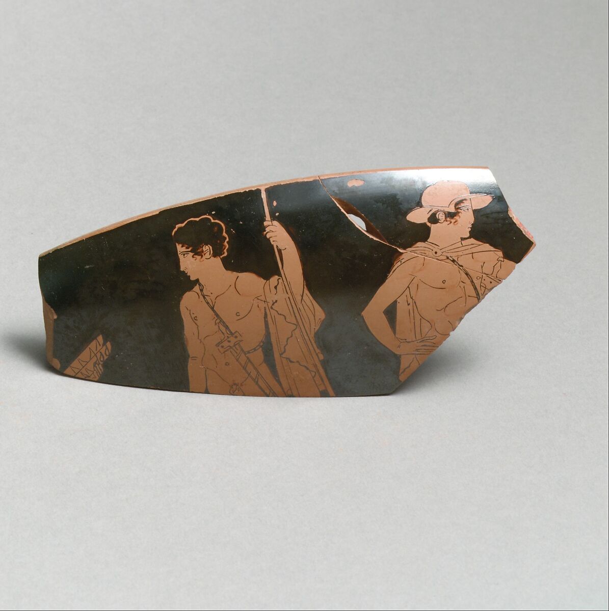 Fragment of a terracotta kylix (drinking cup), Attributed to the Codrus Painter, Terracotta, Greek, Attic 