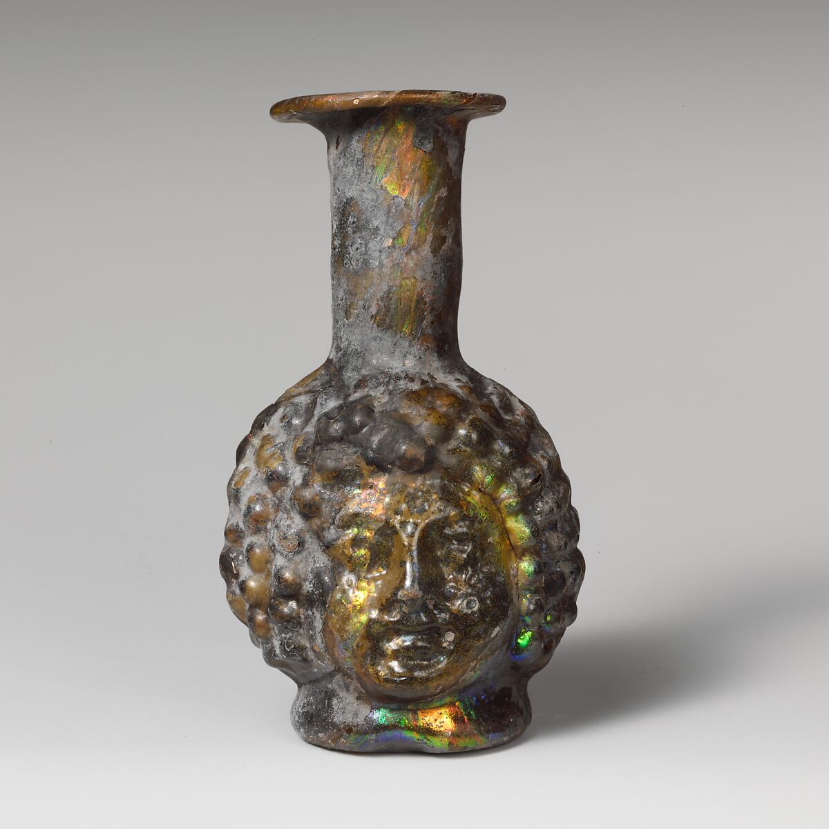 Glass double head-shaped bottle, Glass, Roman, Syrian 