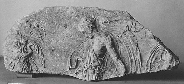 Fragment of a marble relief with dancing maenads
