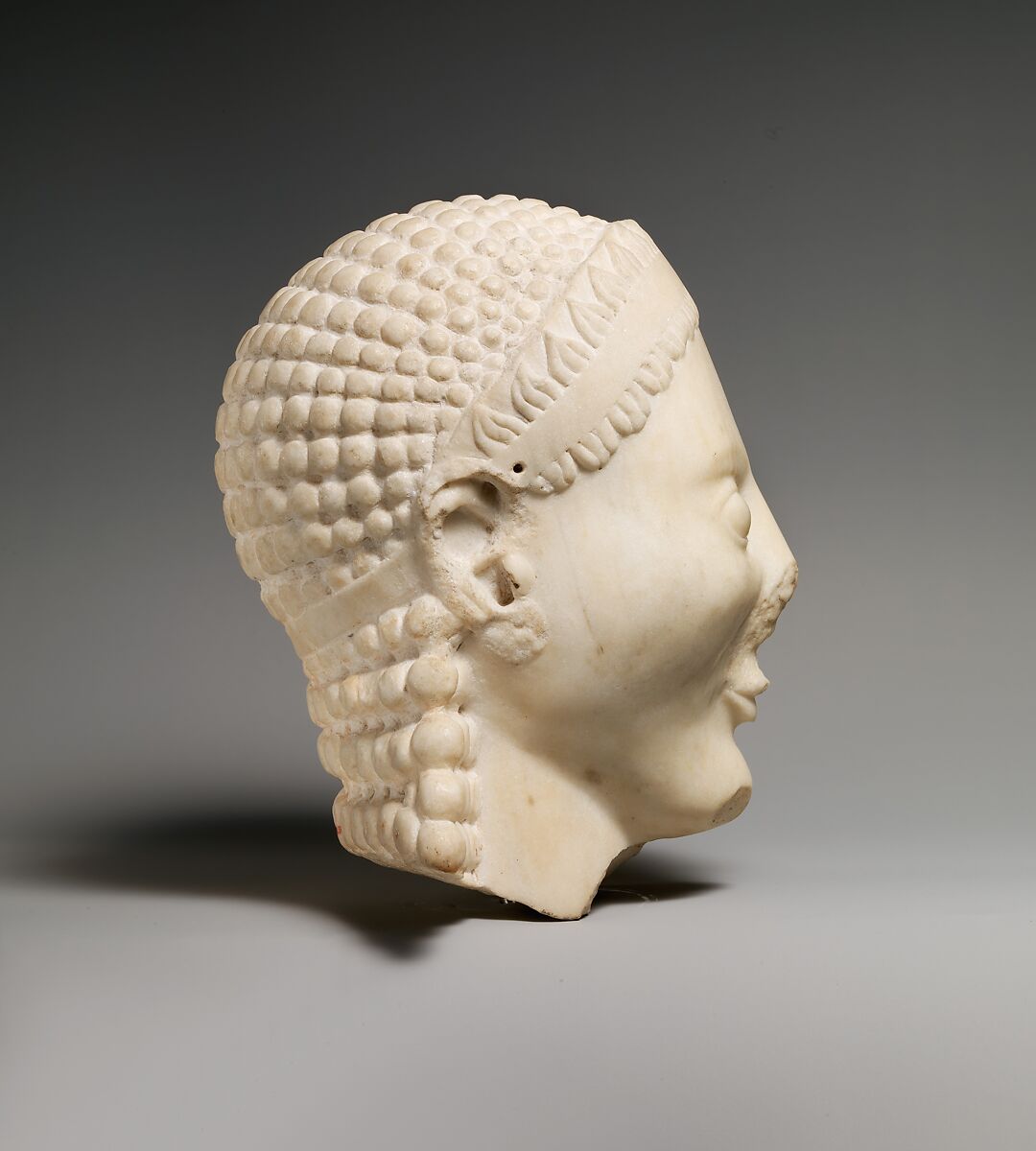 Marble head of a kouros (youth), Marble, Island, Greek, Attic