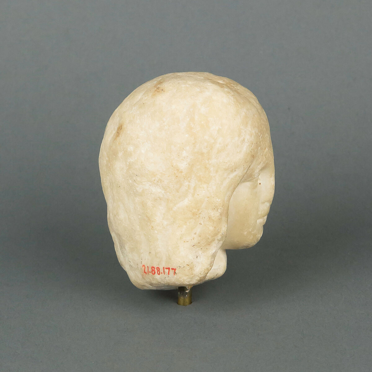 Marble head of a female statuette, Marble, Roman
