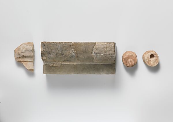 Two gutti from a group of fragments from the Temple of Apollo at Phigaleia (Bassae)