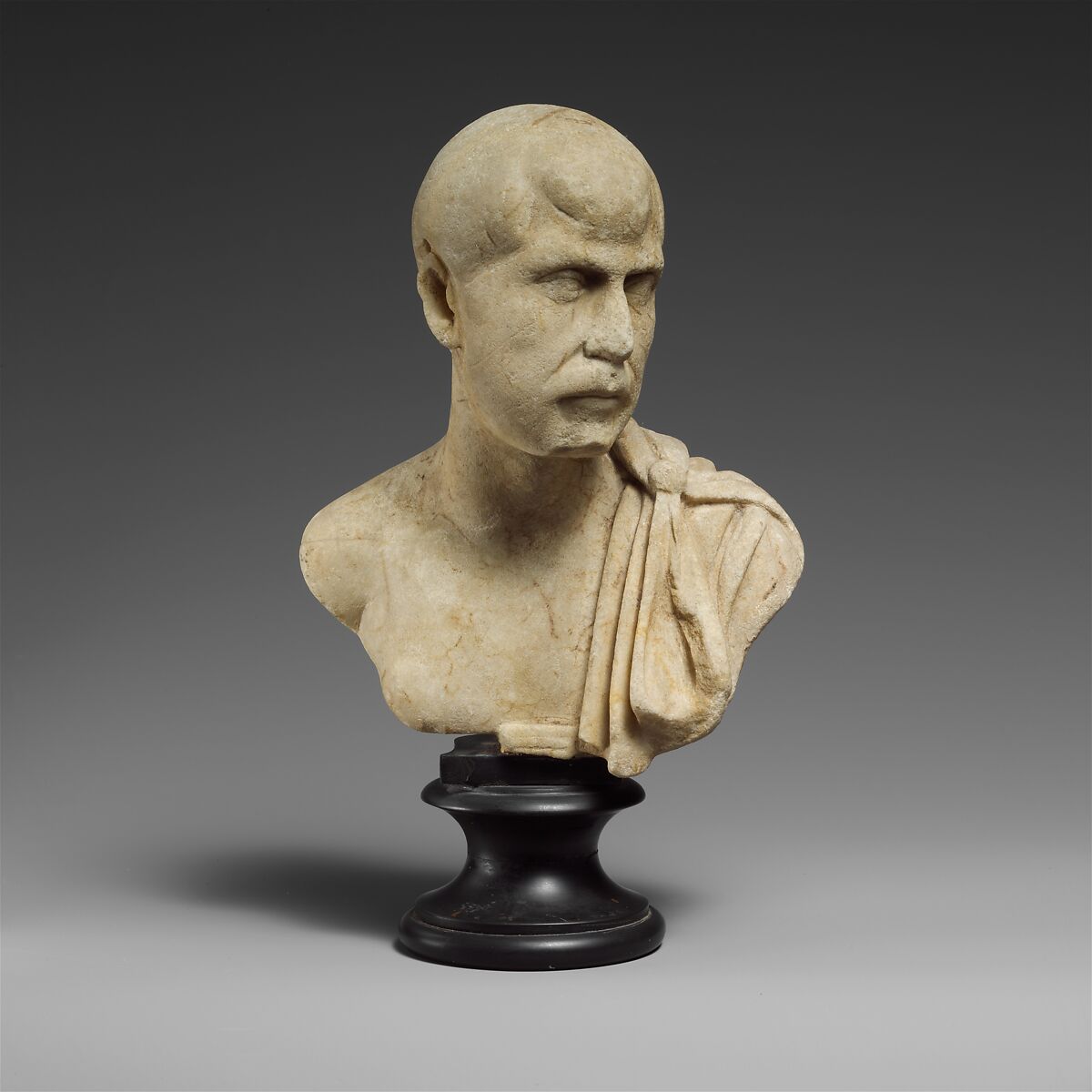 3 / 4 view marble bust of a latino skinny young man