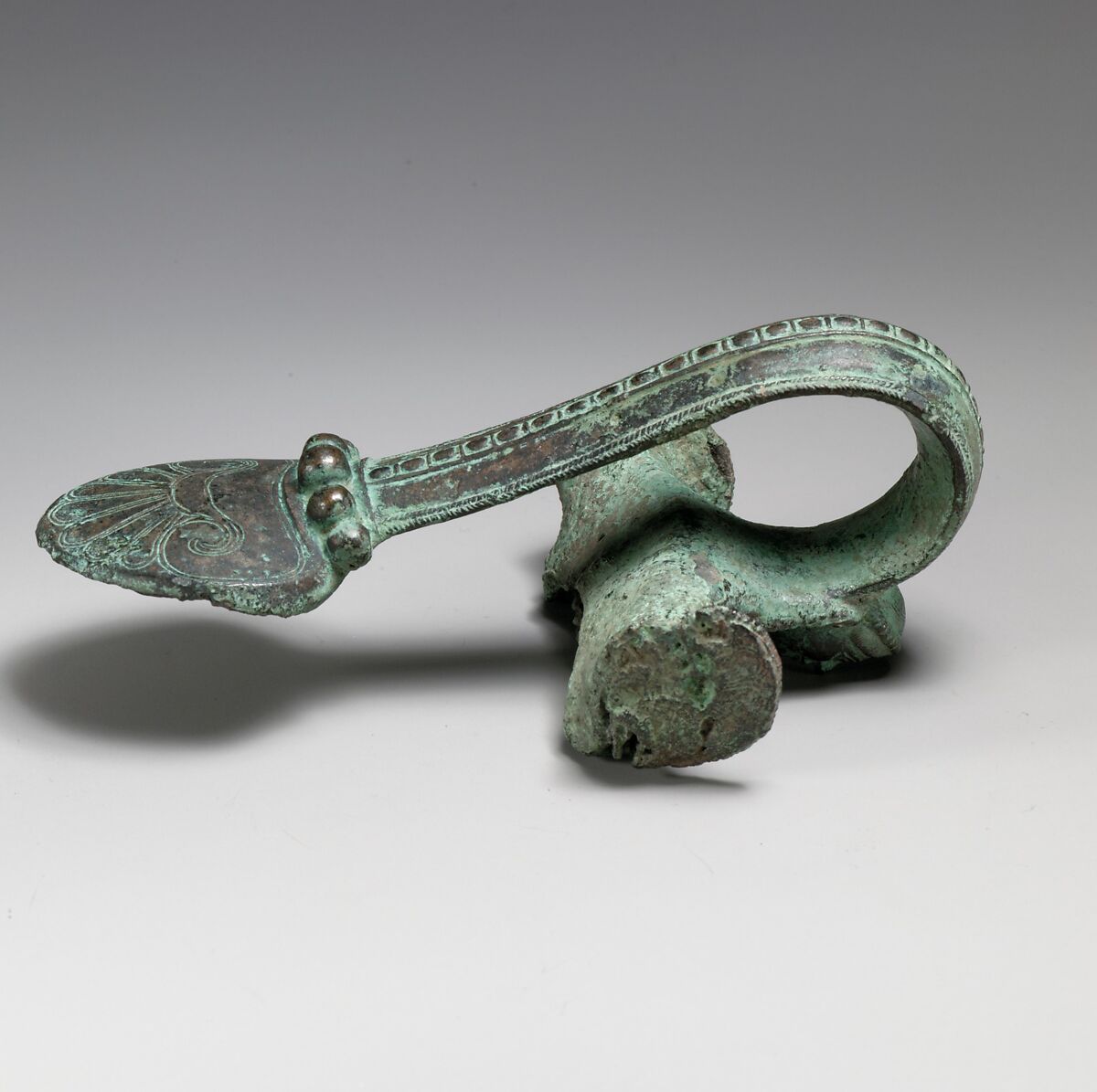 Bronze handle of an oinochoe (jug), Bronze, Greek 