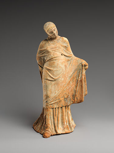 Terracotta statuette of a veiled dancer