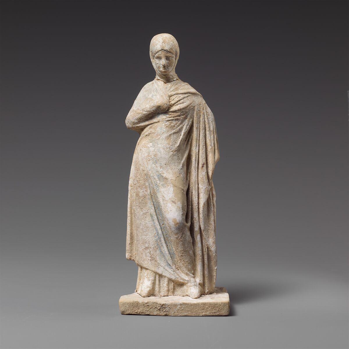Terracotta statuette of a draped woman, Terracotta, Greek, possibly Corinthian 