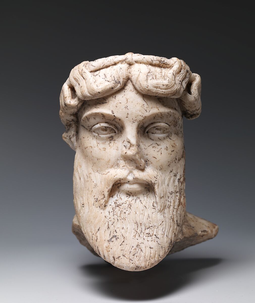 Marble head of a god, probably Dionysos, Marble, Roman 